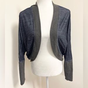 Adorable Gypsy Daisy open front cropped cardigan!